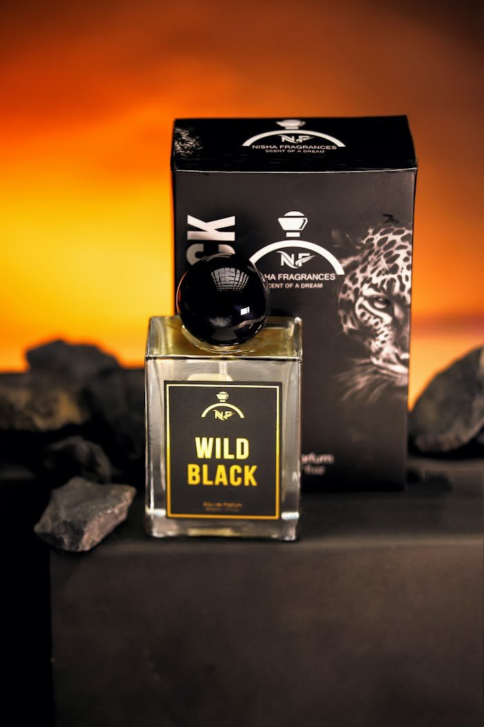 Elegant Wild Black perfume bottle with bold red and black theme, exuding luxury and dramatic flair.