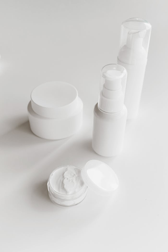 services-img Elegant display of skincare products with a clean, minimalist aesthetic.